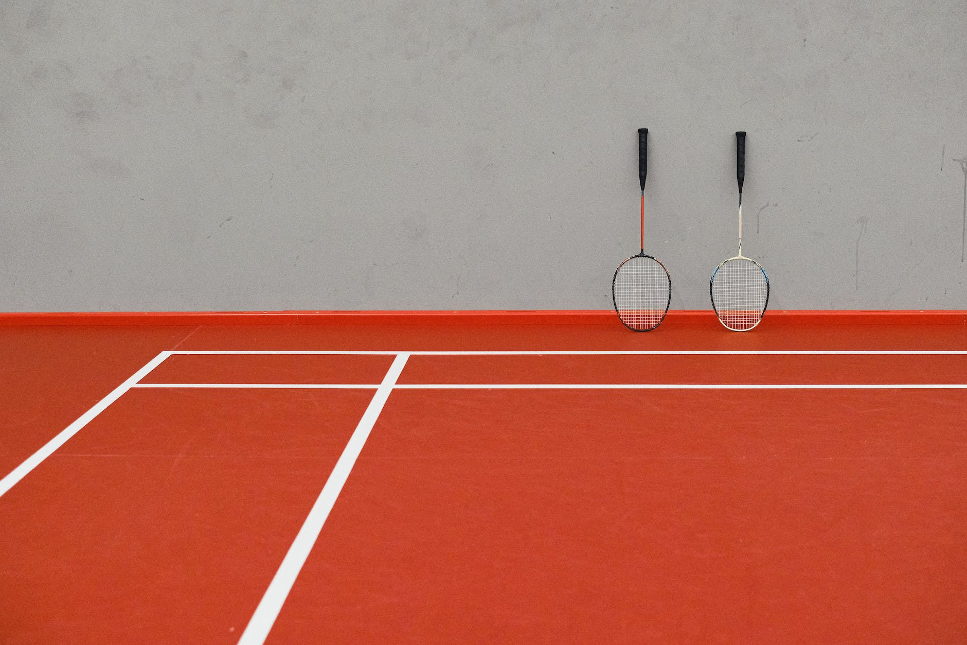 badminton racquets on court